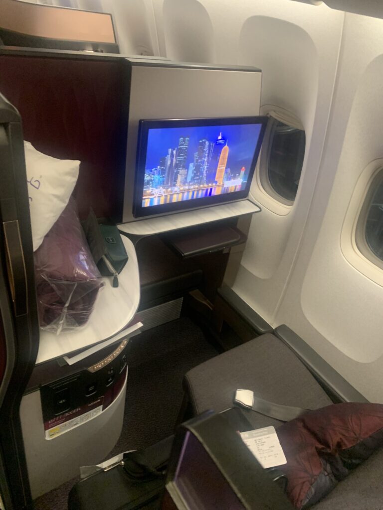 Neil Scrivener reviews Qatar Airways Qsuite from Doha to Heathrow on the Boeing 777-300ER.