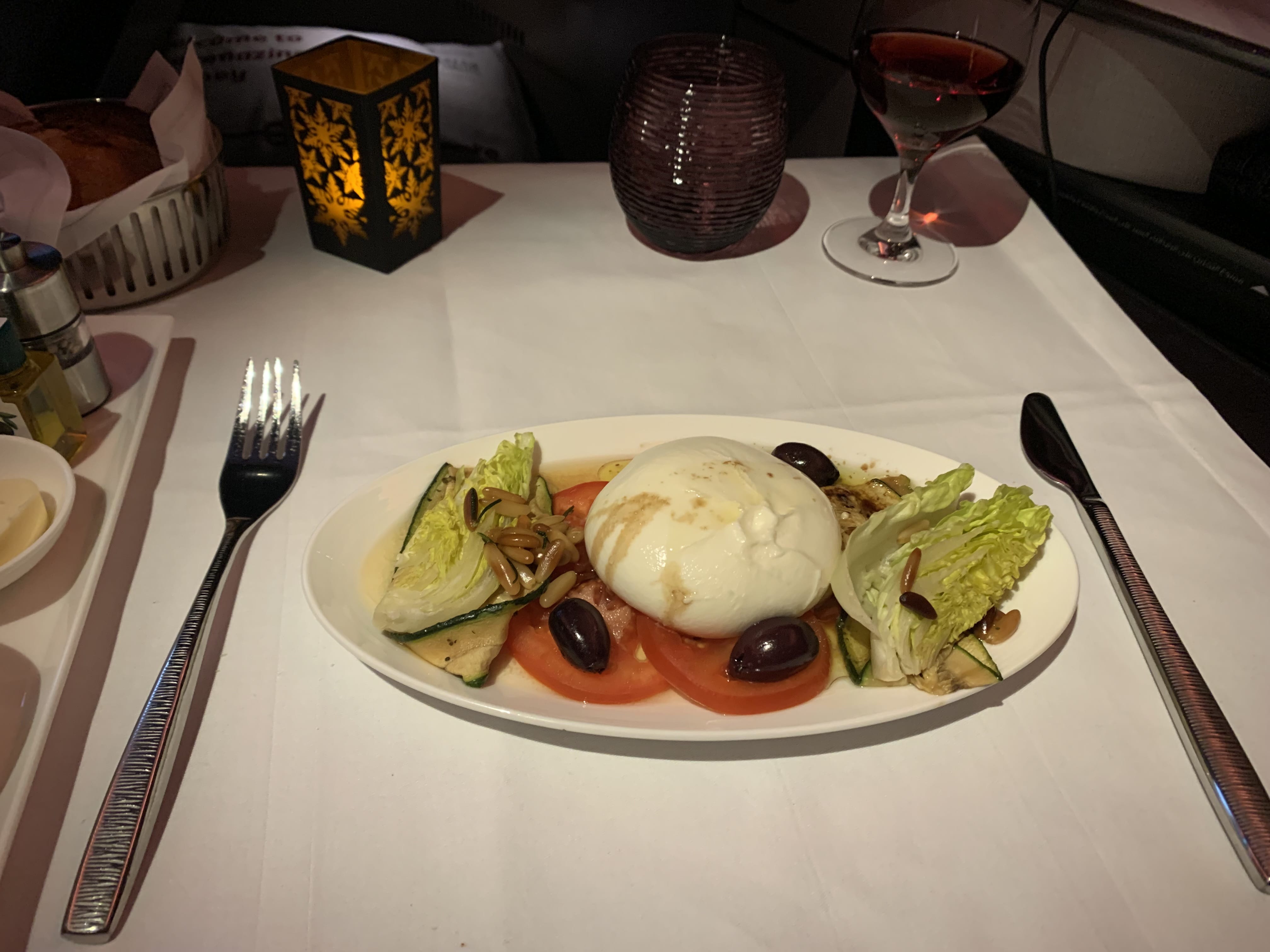 Neil Scrivener reviews Qatar Airways Qsuite from Doha to Heathrow on the Boeing 777-300ER.